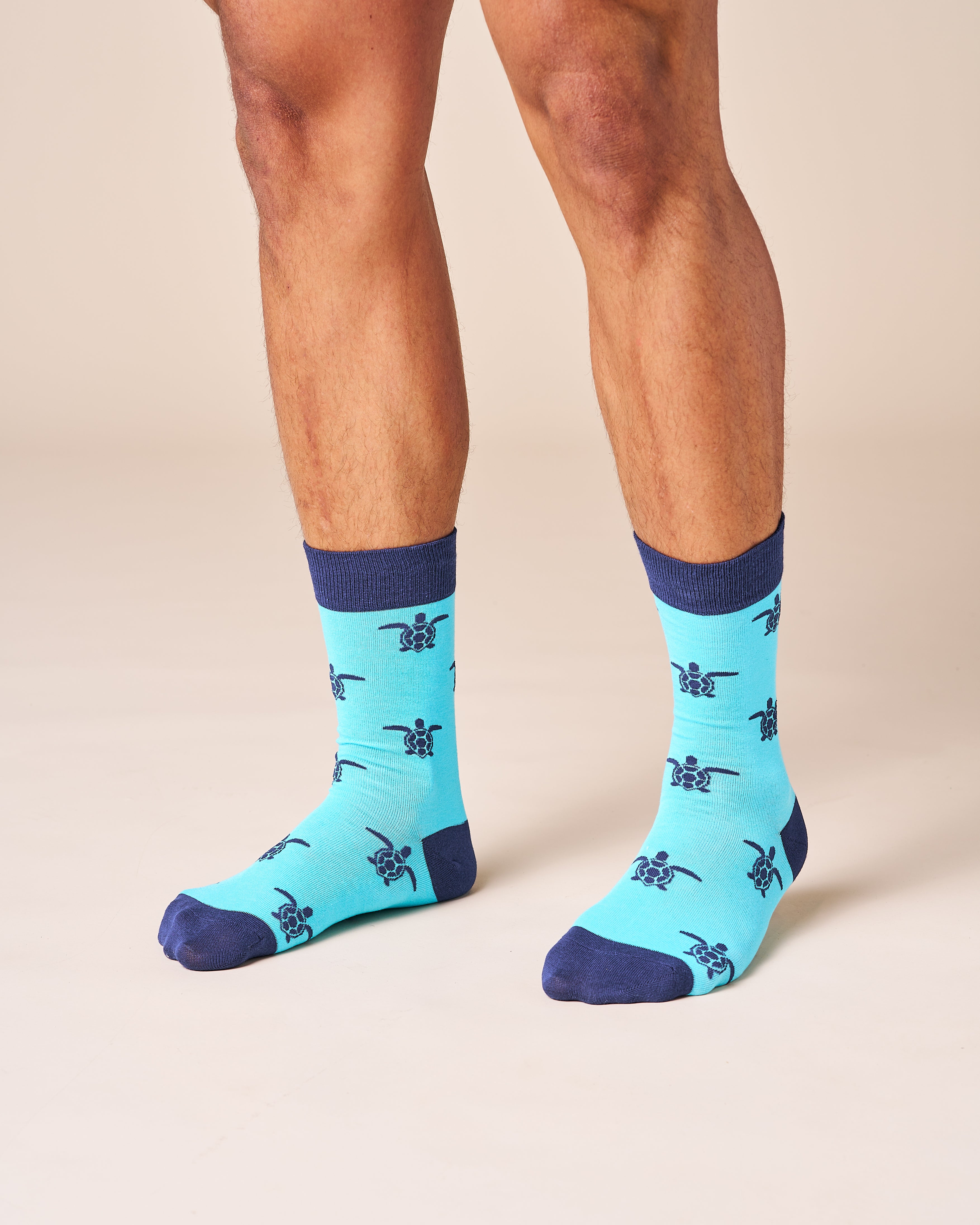 A pair of Men's Fertile Turtle Lucky Socks featuring the turtle design.