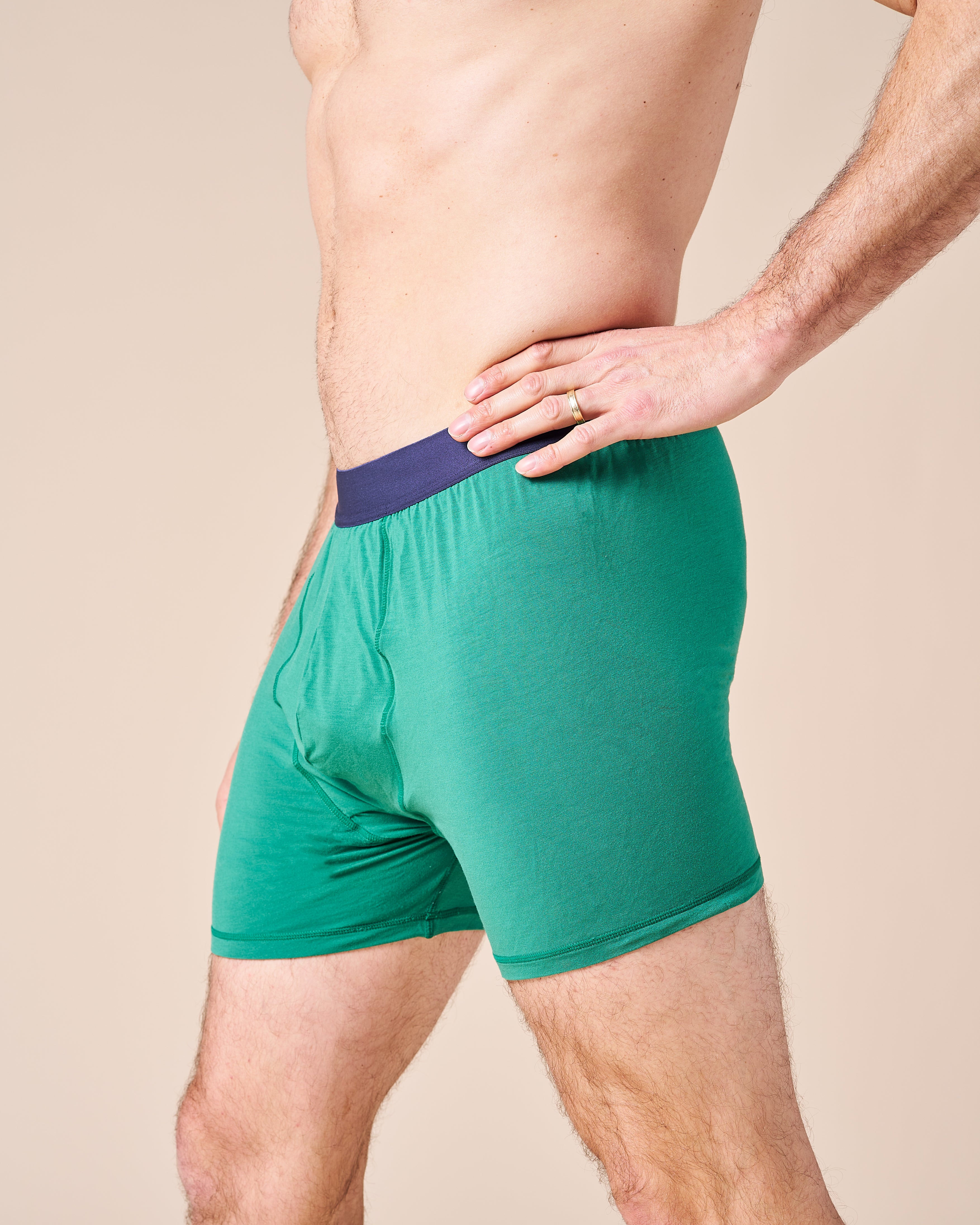 Male model in the Green Fruitful Boxer, demonstrating comfort and support.