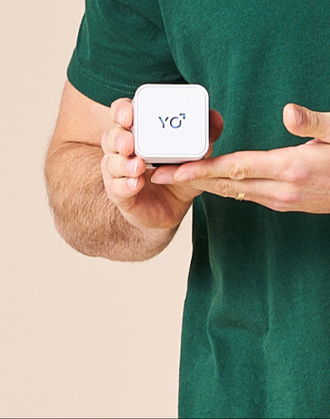A man holding the Fertile Fruit at home sperm tester, ready to begin his fertility journey.